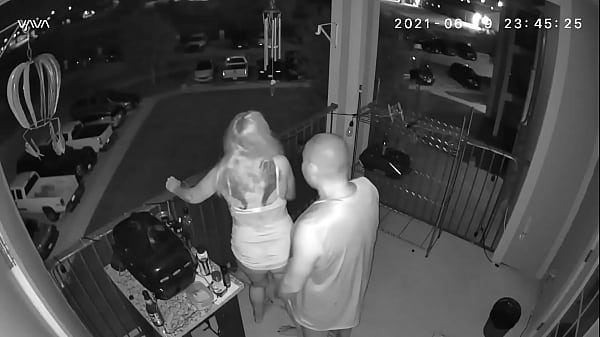 Couple caught on the balcony
